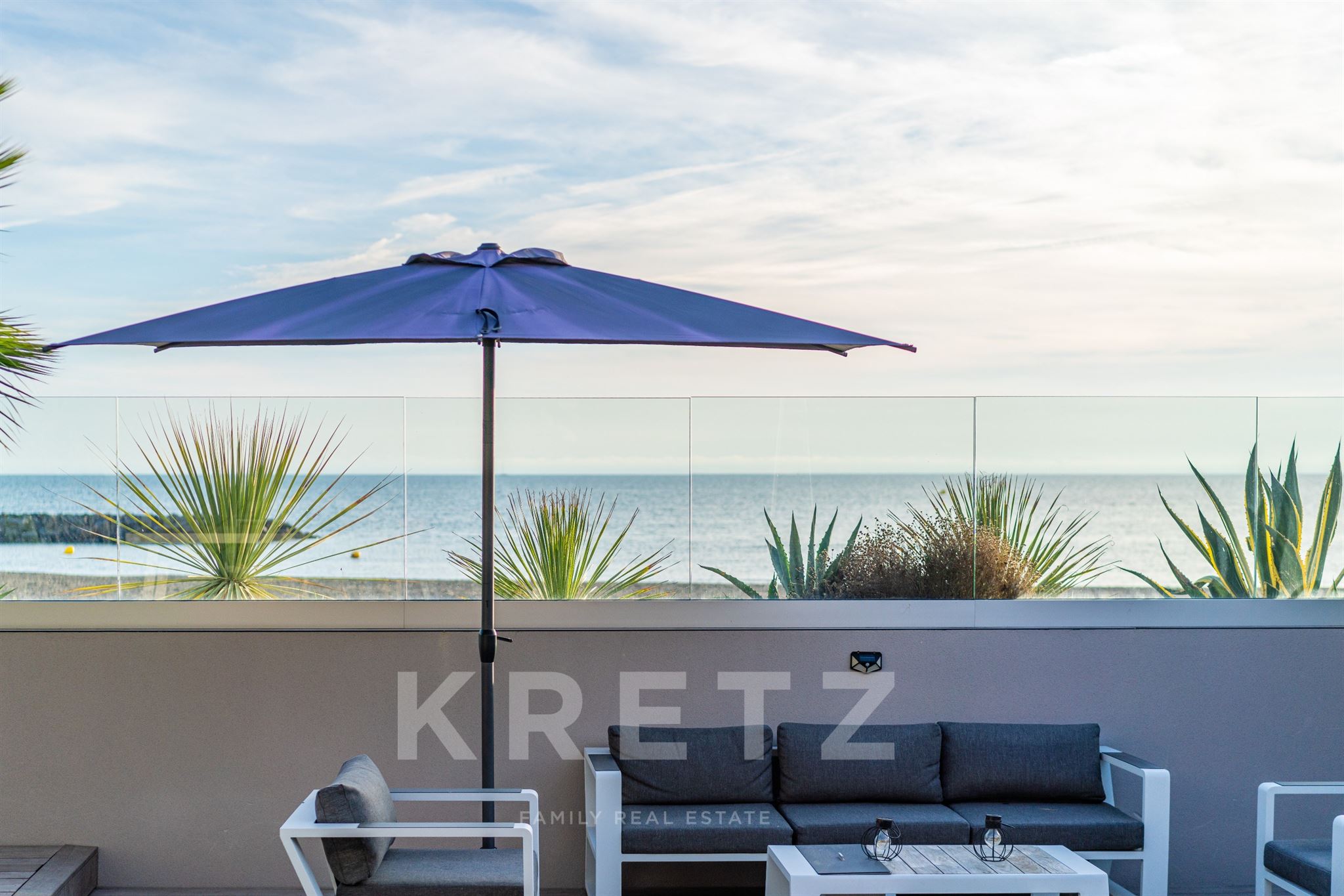 Exceptional architect-designed villa on the front line facing the sea
