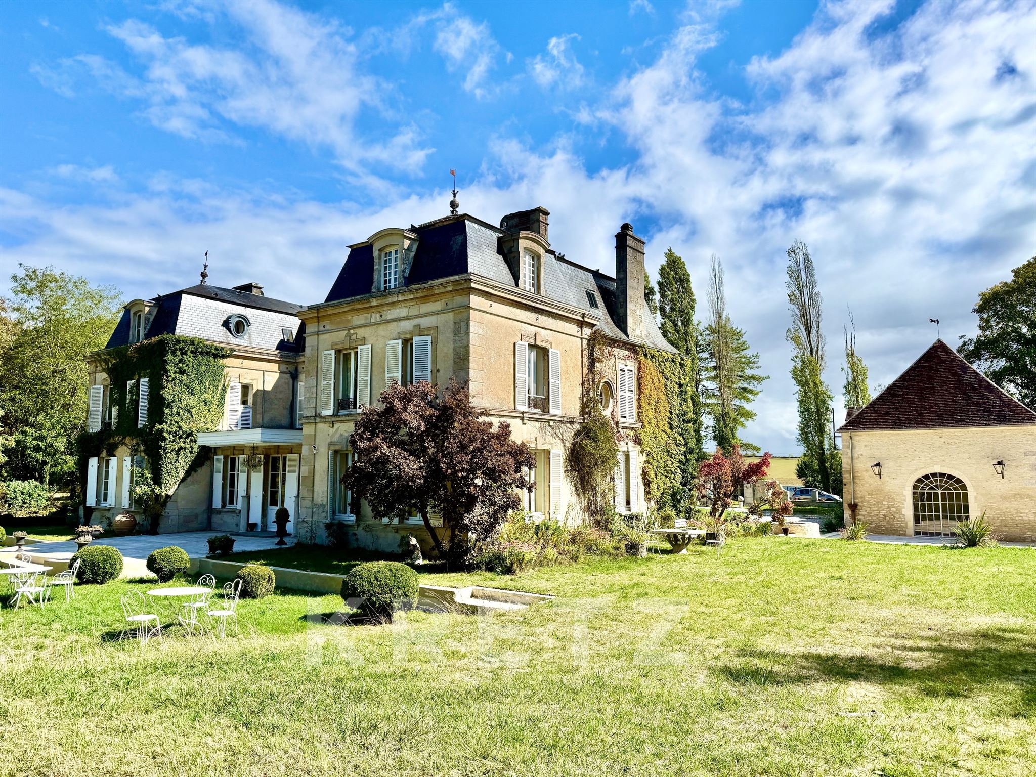 Elegant 18th-Century Château with Restored Outbuildings and 10 ha Estate — Orne, Normandy
