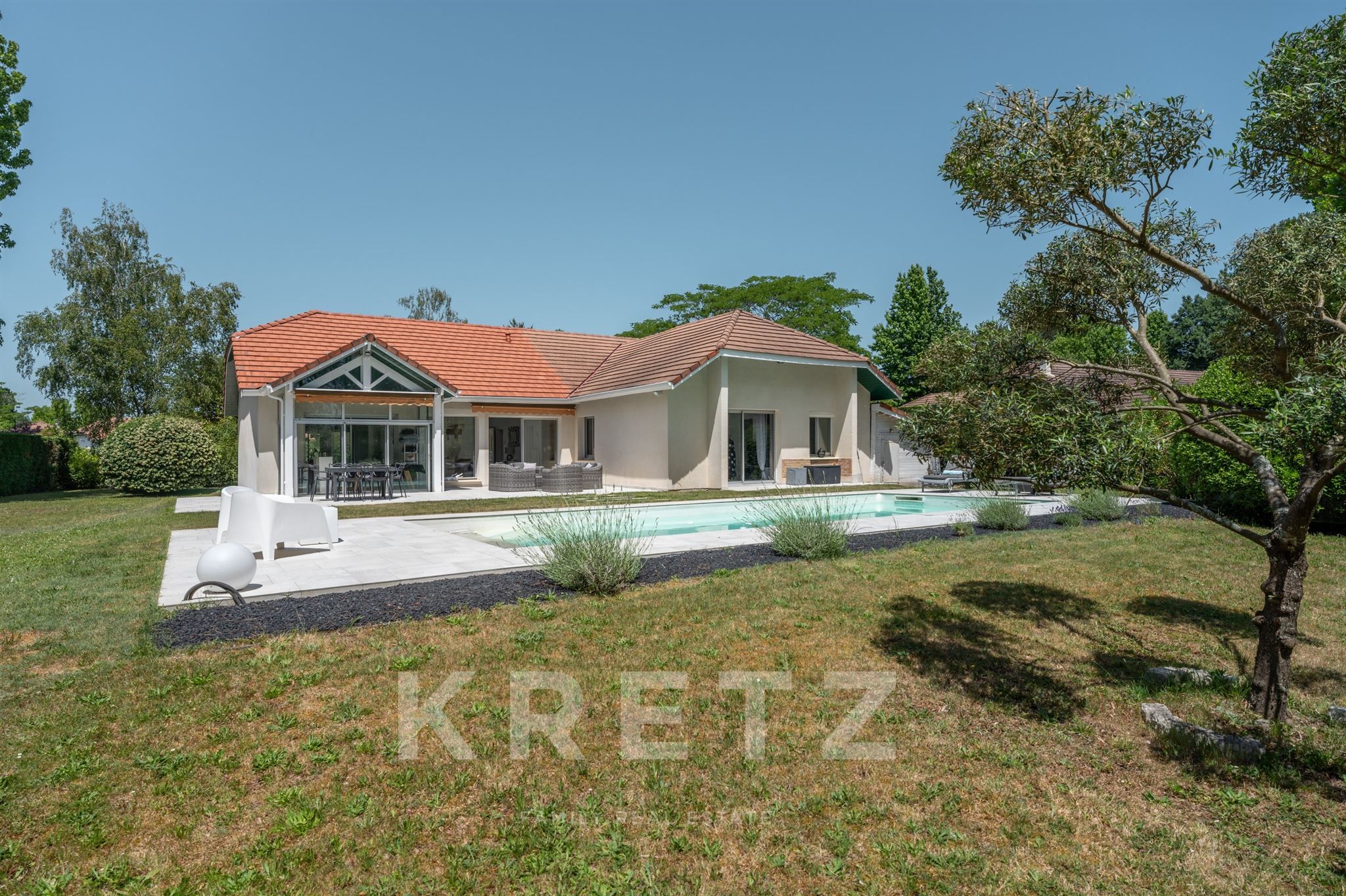 Single-story home on the edge of the Pessac Golf Course