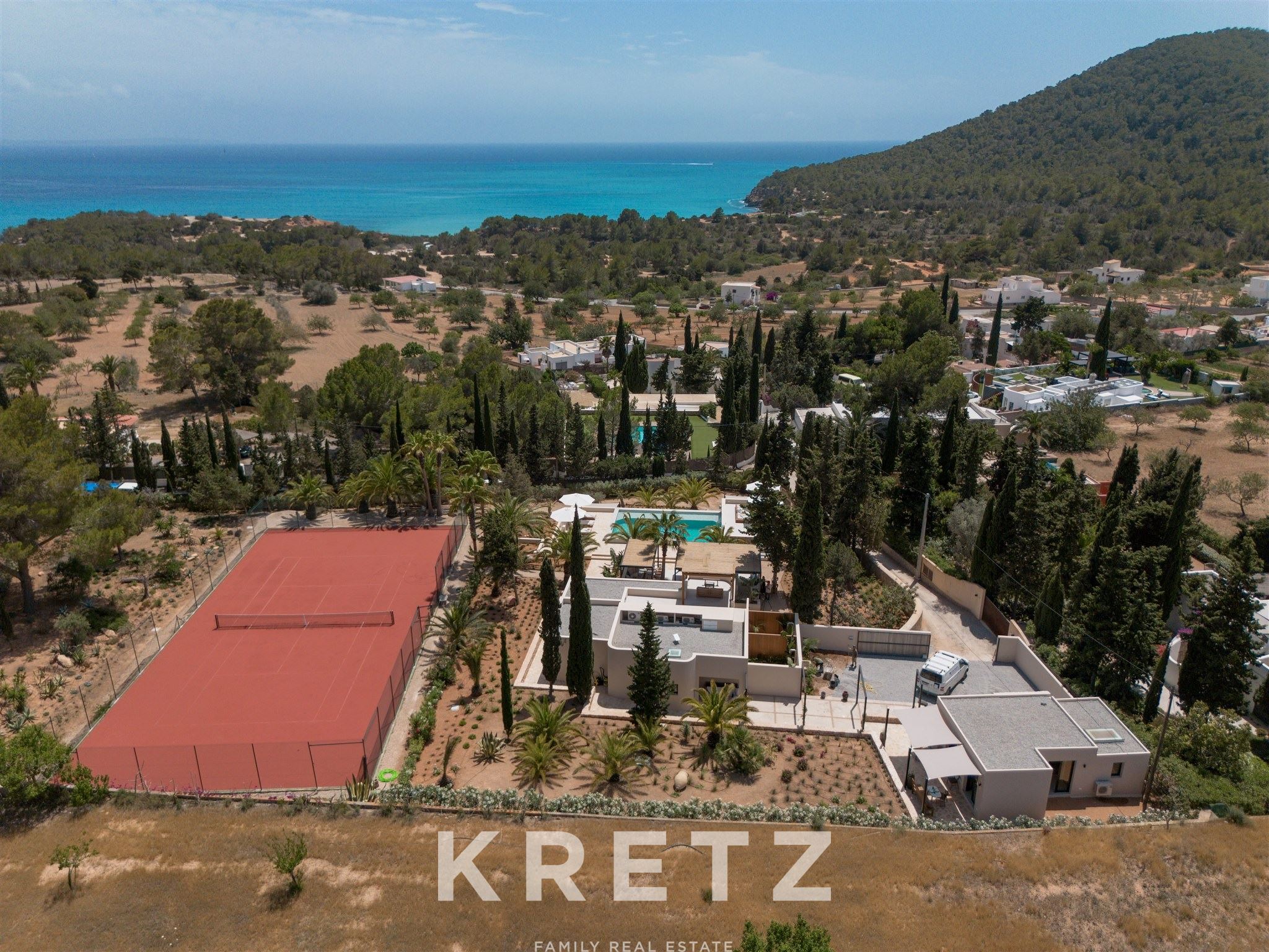 Private estate featuring main house, guesthouse, studio, pool, tennis court, and sea views