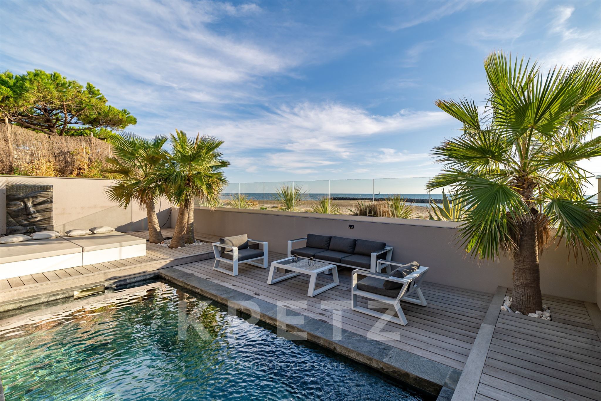 Exceptional architect-designed villa on the front line facing the sea