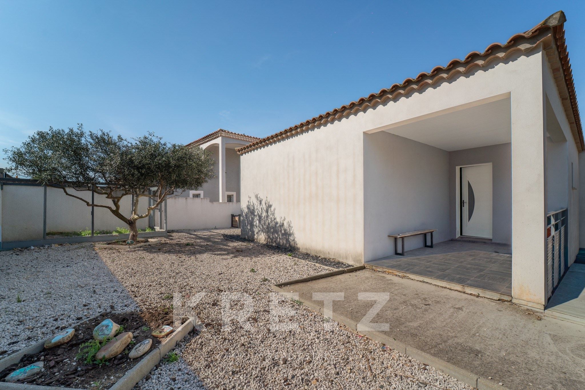 contemporary house with an outbuilding