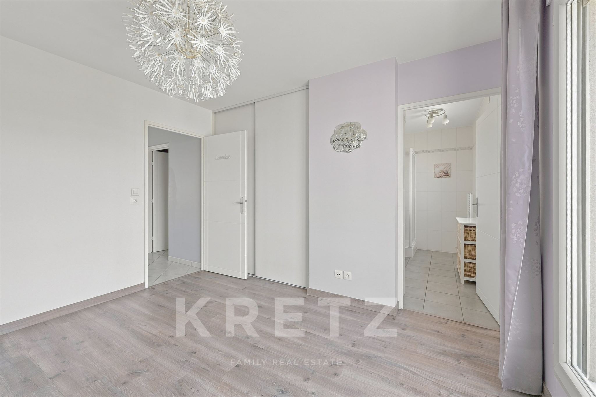 ANNECY – T5 en attique avec 45 m² de terrasses – Résidence de standing – Garage.