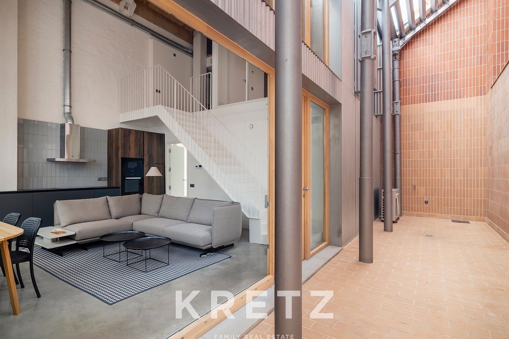 Duplex Loft with 7-Metre Ceilings and Private Patio in the Historic Can Ricart Factory