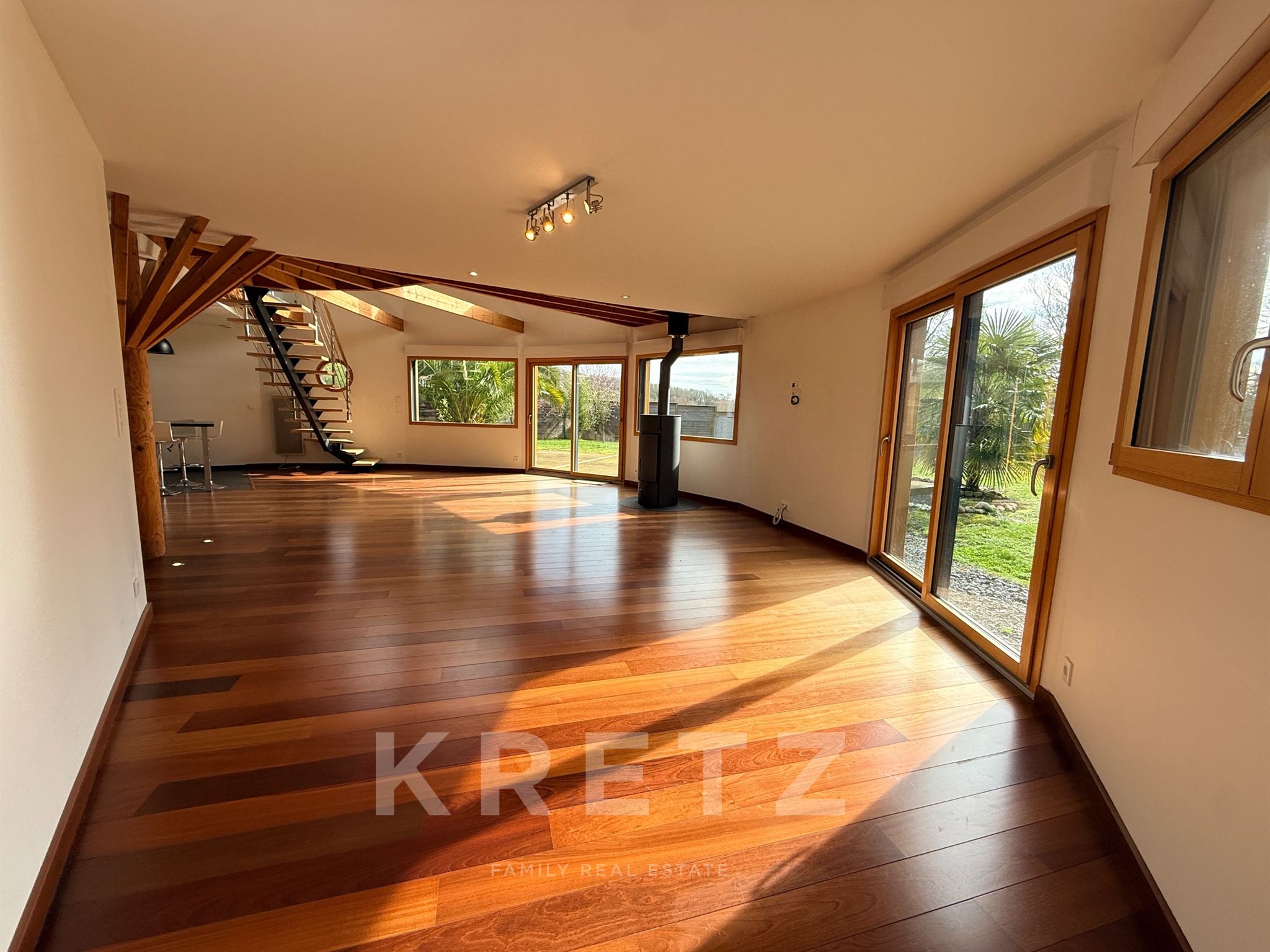 Architect-Designed Cedar Wood House with Landscaped Garden Near a Lake